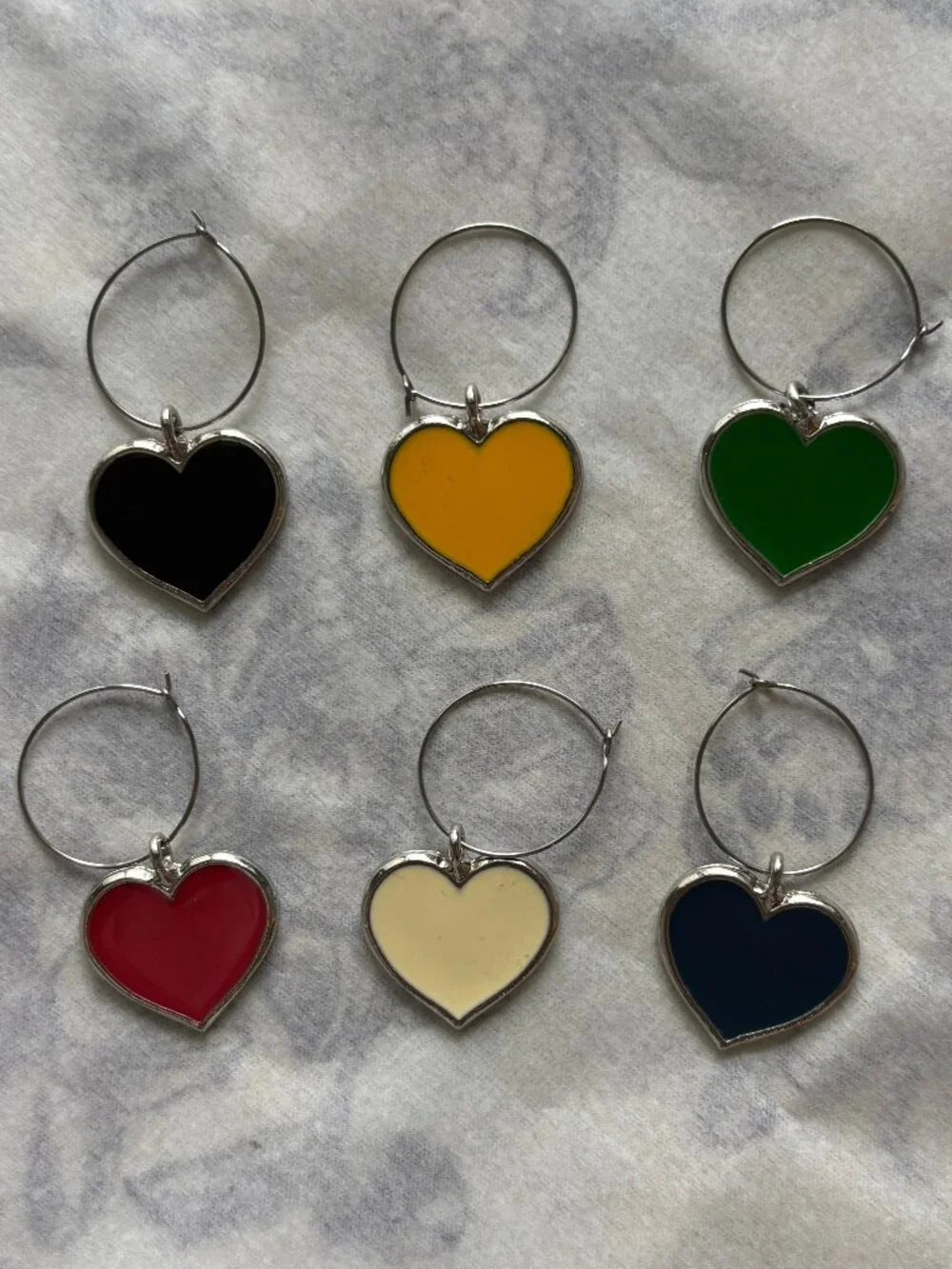 Set of Six Colored Enamel Heart Wine Charms on Silver Ring